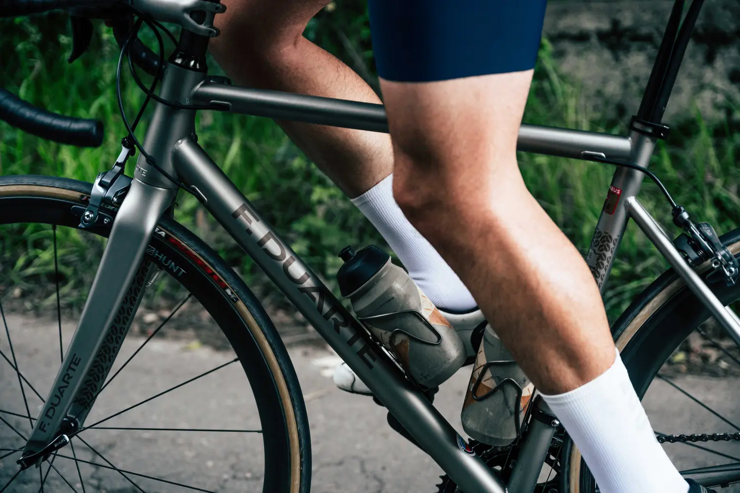 Close-up of a cyclist's knees and legs in motion